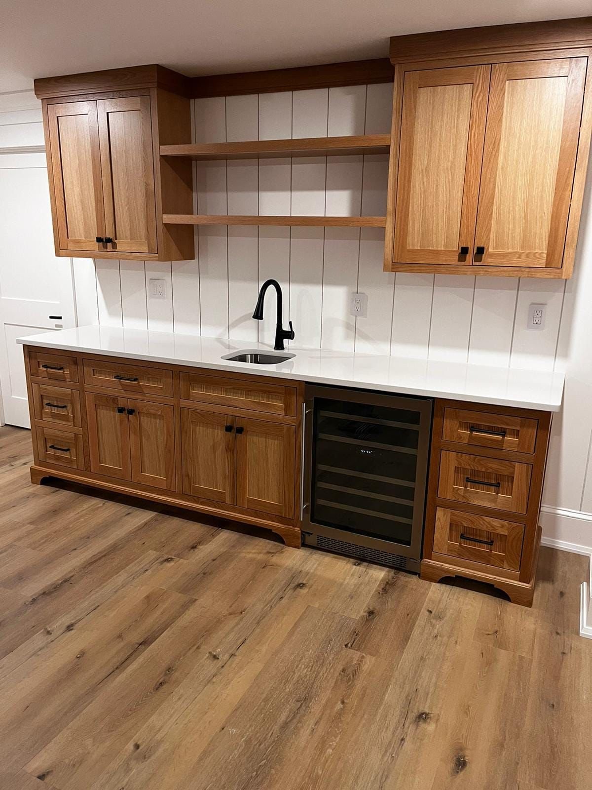 Repainted kitchen cabinets by WR Pro Painters