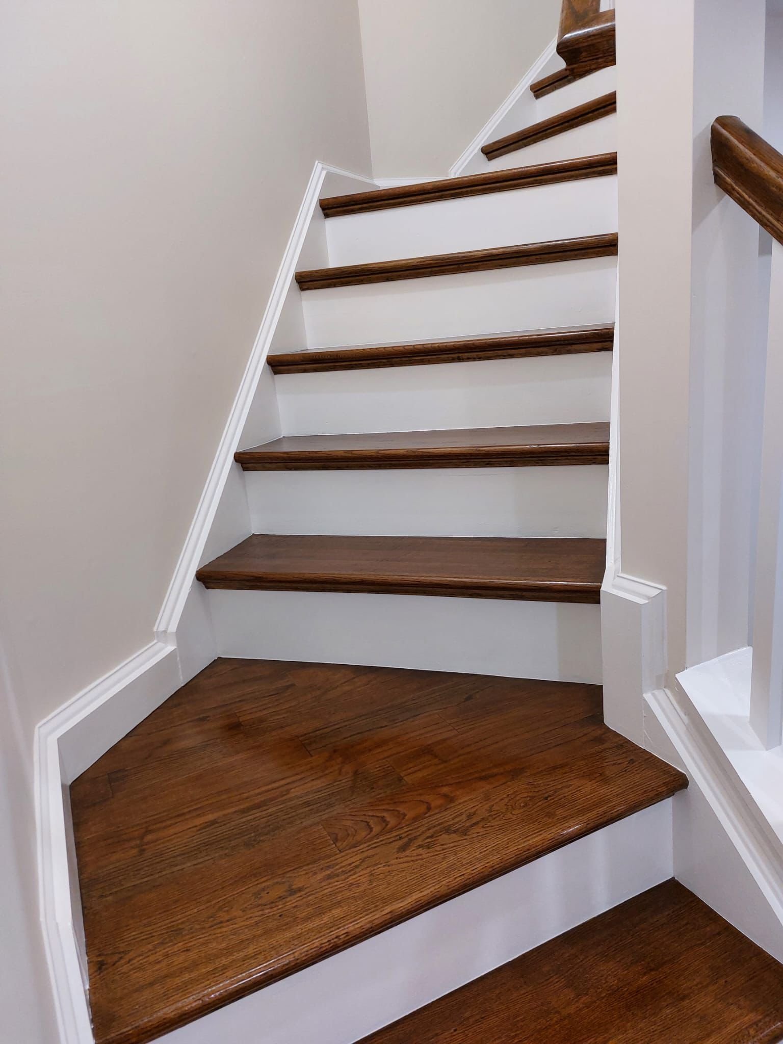 Repainted staircase and trim by WR Pro Painters